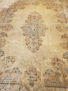 Bottom right view of wool Kirman area rug
