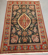 Load image into Gallery viewer, Iranian hand-knotted wool carpet black field white fringe